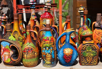 Borjomi, Georgia: Decorative ceramic jugs with vine - traditional Georgian souvenirs.