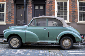 vintage blue car in an English street