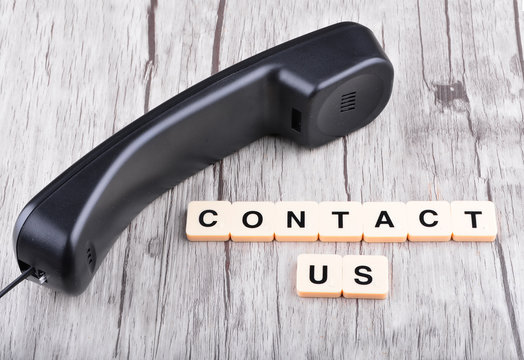Contact Us Concept. Telephone with word "Contact US"