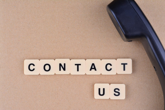 Contact Us Concept. Telephone with word "Contact US"
