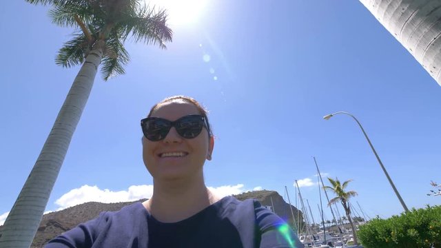 Happy woman having fun and enjoying tropical resort in 4k slow motion 60fps