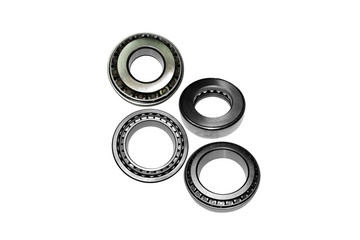 Different types of automotive bearings isolated on white background