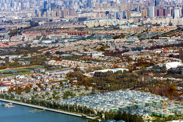Top view of the modern multi-million city of Kunming, China. Kunming is capital of Yunnan province , most famous city of southwest China and southeast Asian on the shore on the north shore of Dianchi 
