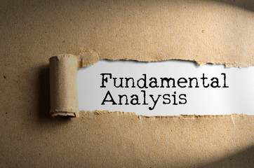 Torn paper with word FUNDAMENTAL ANALYSIS. Conceptual Images