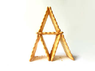 House of yellow rectangular biscuit house isolated object on a white background.