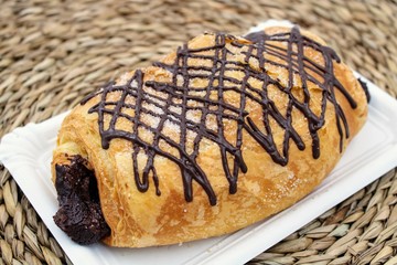 Fluffy croissant with chocolate