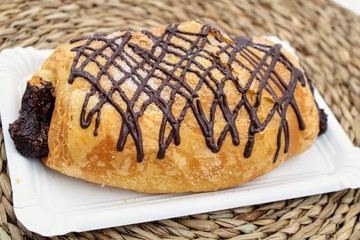 Fluffy croissant with chocolate