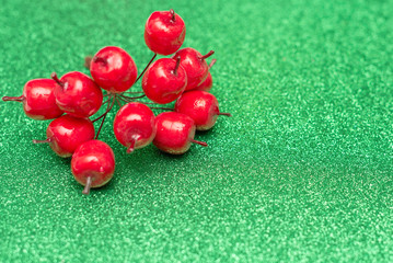 Christmas gift boxes on a green shiny background