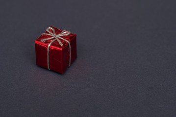 red gift box on dark background