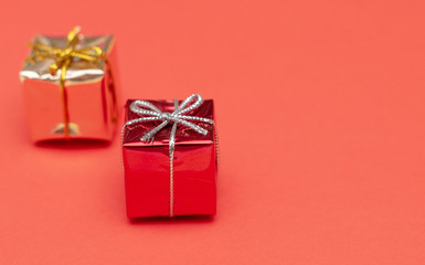 gold and red gift boxes on red background