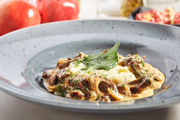 Classic Russian Beef Stroganoff or Beef Stroganov with Mashed Potatoes and Greens