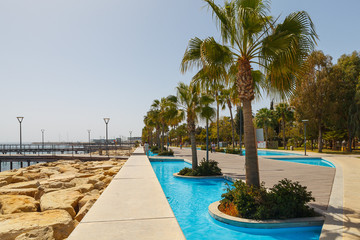 LIMASSOL, CYPRUS - MAY 10, 2018: Molos promenade on the coast of Limassol city in Cyprus, day time