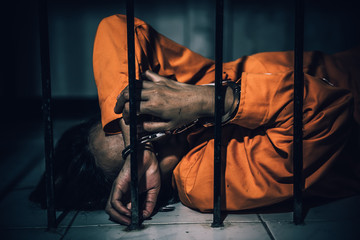 Portrait of women desperate to catch the iron prison,prisoner concept,thailand people,Hope to be...