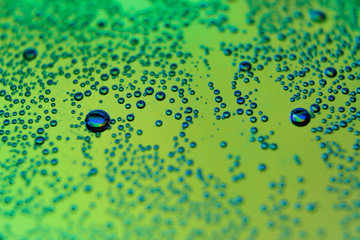 beautiful vials of air in water on a multi-colored background