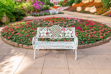 Colorful gardens and lounge chairs in the garden