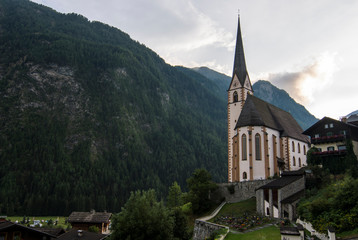 Fototapeta premium A beautiful village Heiligenblut am Grossglockner surrounded by mountains in Austria