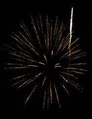 Fireworks sparkles in the night sky as background