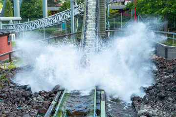 Fun water ride Log river in amusement park at summer