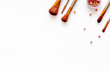 Instruments for make up with brushes, blusher on white background top view mock up