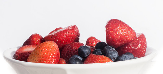 Bowl of strawberries and blueberries