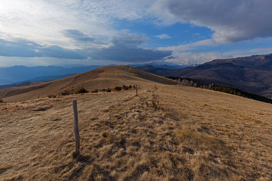View from the Fal&ograve; mount near the Mottarone mount, alps on the background, Piedmont, Italy.