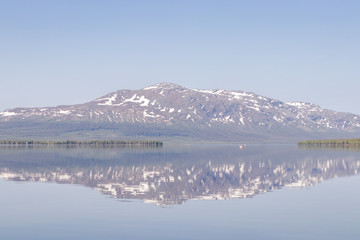 sweden alps with reflection in calm lake