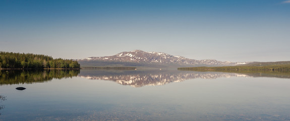 the swedish mountains with lake infront