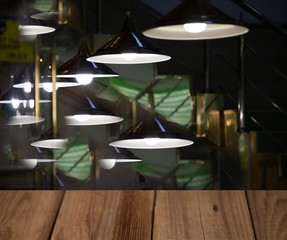 vintage wooden table on blurred cafe background dining room restaurant