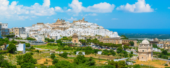 Panoramic view of Ostuni in a sunny summer day, Apulia (Puglia), southern Italy. - obrazy, fototapety, plakaty