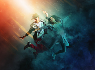 Hip-hop dance party.  Couple hip-hop dancing