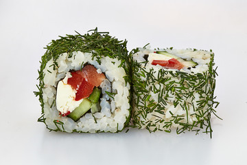 Sushi rolls japanese food isolated on white background. California Sushi roll with tuna, vegetables and unagi sauce closeup.