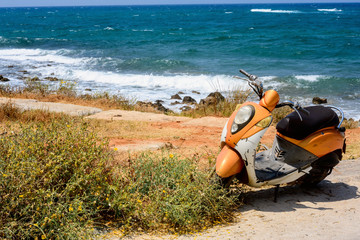 Motorbike is on the sea coast