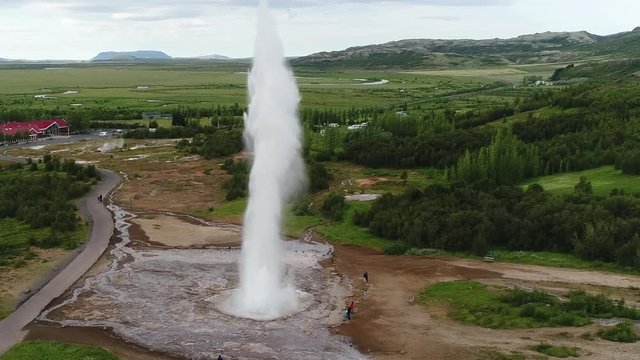 Iceland geyser drone aerial video - Strokkur geyser aka Geysir. Famous Iceland tourist attraction and landmark on the Golden Circle.