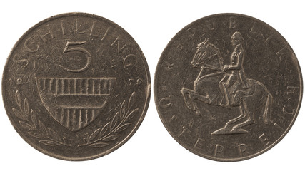 Five Austrian schilling, 1979. Wintage aluminum metal coin with horse rider isolated on white.