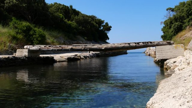 Korission Lagoon/Lake drains into the Ionian Sea through a channel which bisects Chalikouna Beach