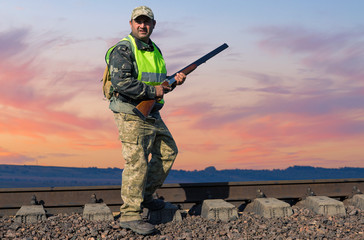 Hunter with a german drathaar and spaniel, pigeon hunting with dogs