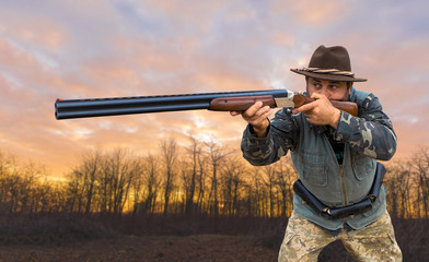 Fototapeta premium Hunter with a german drathaar and spaniel, pigeon hunting with dogs