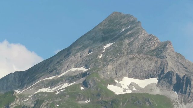 Timelapse of clouds around peak of Kirchspitze mountain in tyrol austria.