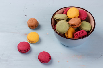 view on a table and a bowl with macaroons