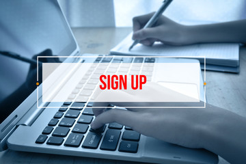 Hand Typing on keyboard with text SIGN UP