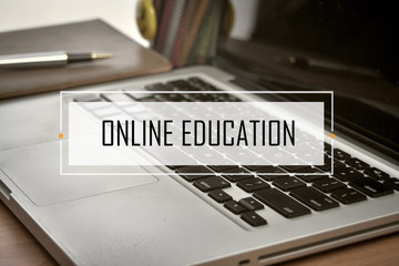 Notebook and Laptop with text ONLINE EDUCATION