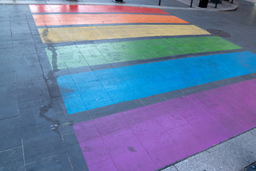 Pedestrian crossing marking in LGBT colors lesbian gay in Bordeaux city France