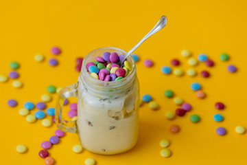 Cup of cream ice-cream with candy in dragee