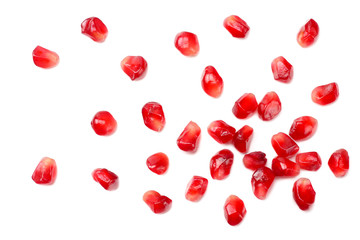 pomegranate seeds isolated on white background. top view