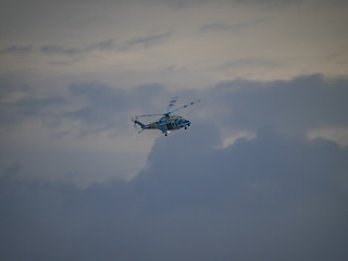  Helicopter in the sunset  over the Caribbean island of Curacao