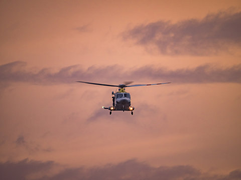  Helicopter in the sunset  over the Caribbean island of Curacao