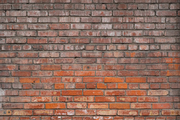 Background Of Old Vintage Dirty Brick Wall With Peeling Plaster, Texture. Shabby Building Facade With Damaged Plaster. Abstract Web Banner. Copy Space.