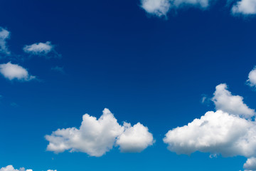 White, Fluffy Clouds In Blue Sky. Abstract Background From Clouds.