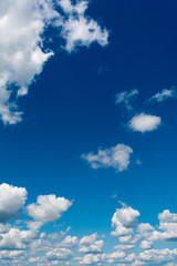 White, Fluffy Clouds In Blue Sky. Abstract Background From Clouds.