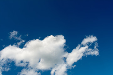 White, Fluffy Clouds In Blue Sky. Abstract Background From Clouds.